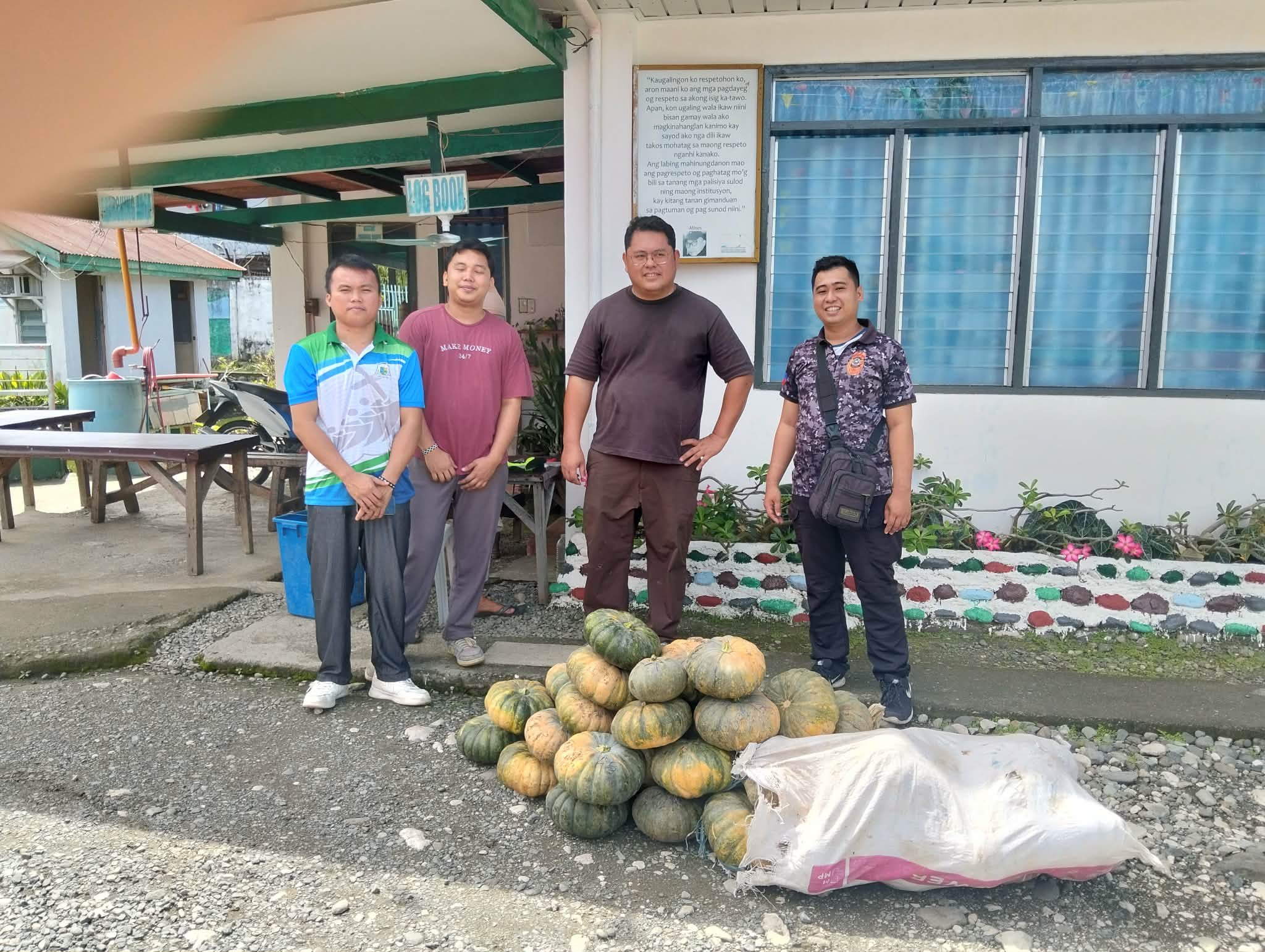 Farmers with squash harvest